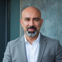 A headshot of Yasser Yoshua Wardasbi