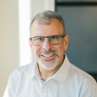 A headshot of Alain Mowad