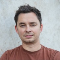 A headshot of Andrei Papancea