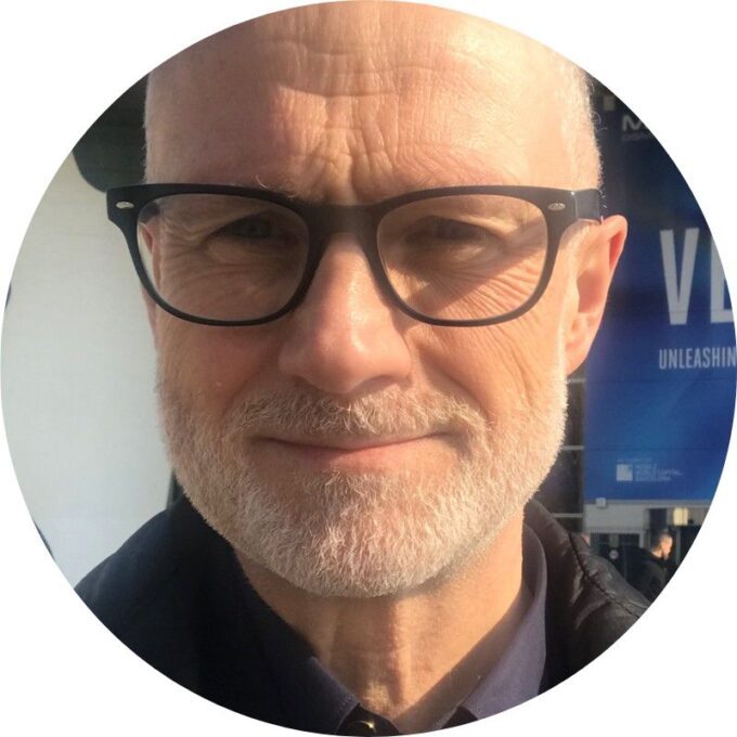 A headshot of Andrew Collinson