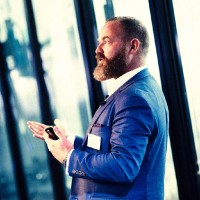 A headshot of Andrew Moorhouse