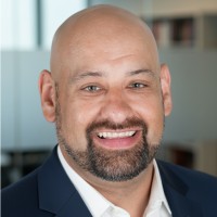 A headshot of Chris Krystalowich