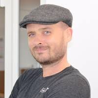 A headshot of Christof Bollenbeck