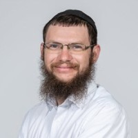 A headshot of Doron Gower