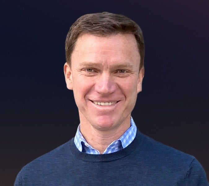 A headshot of John Andrews