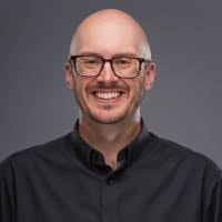 A headshot of Justin Robbins