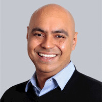A headshot of Karthik Suri