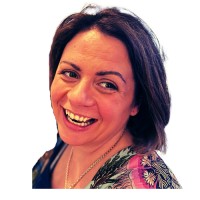 A headshot of Maria McCann