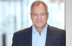 A headshot of Mark Bishof