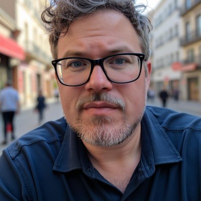 A headshot of Mathew Clare