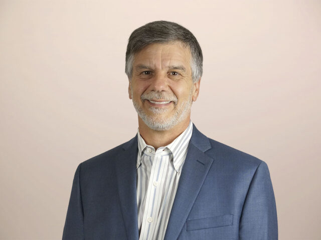 A headshot of Max Ball
