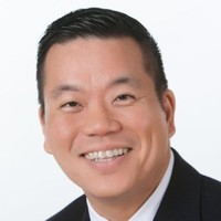A headshot of Mike Aoki