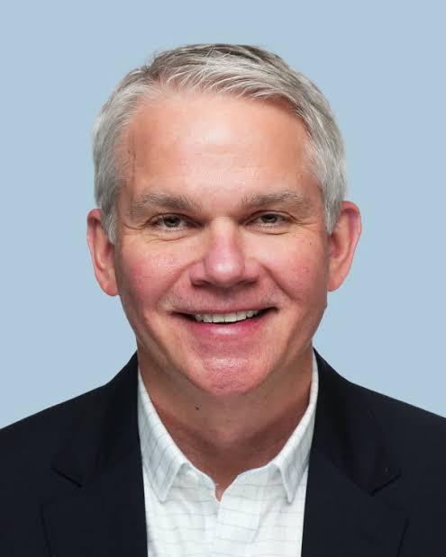 A headshot of Mike Szilagyi