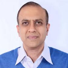 A headshot of Muddu Sudhakar