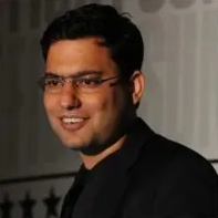 A headshot of Nitin Mangtani