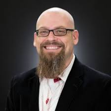 A headshot of Rob Dwyer