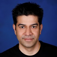 A headshot of Rohan Kumar