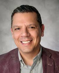 A headshot of Ryan Rivera