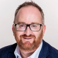 A headshot of Simon Foot