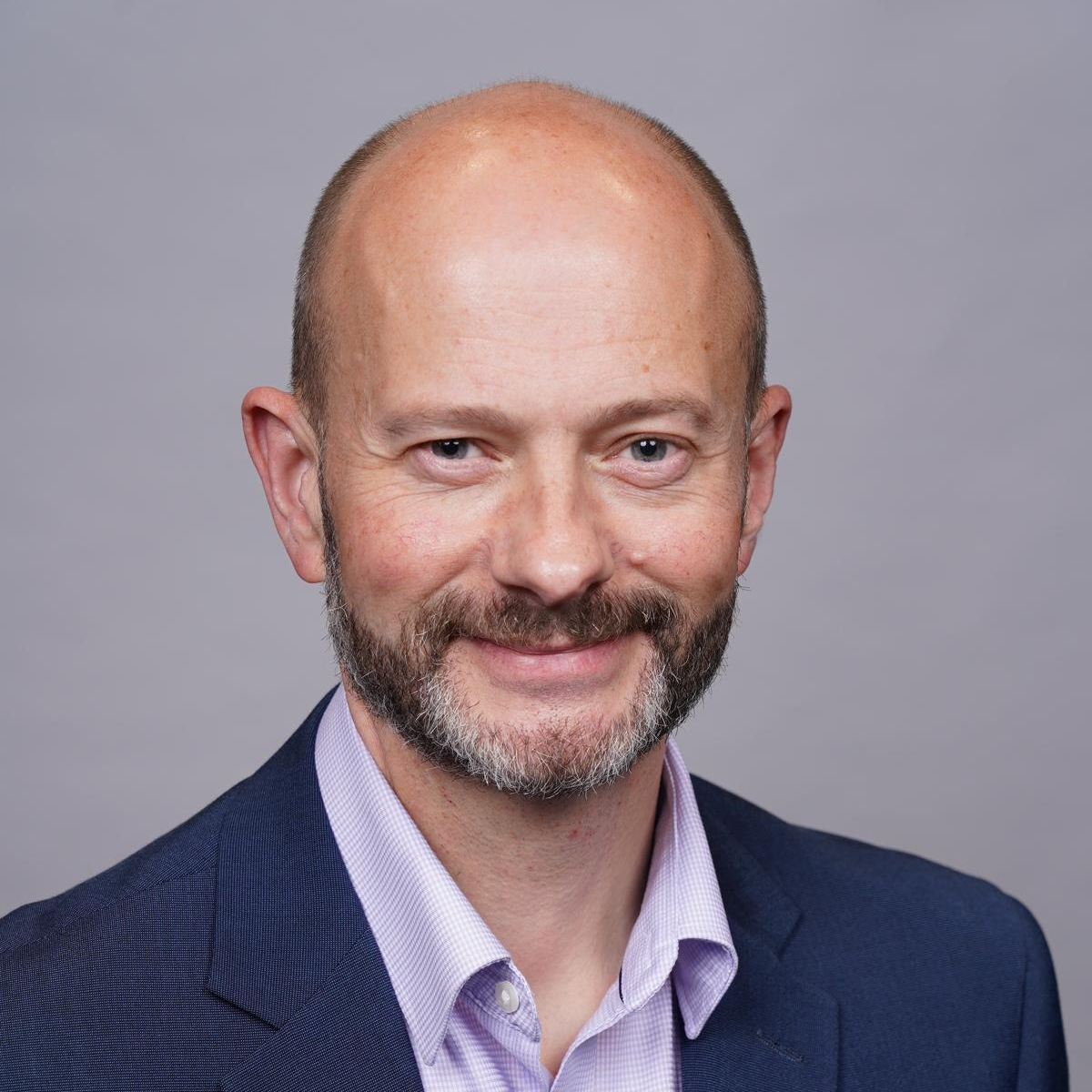 A headshot of Tim Banting