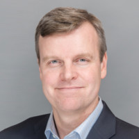 A headshot of Tom Eggemeier