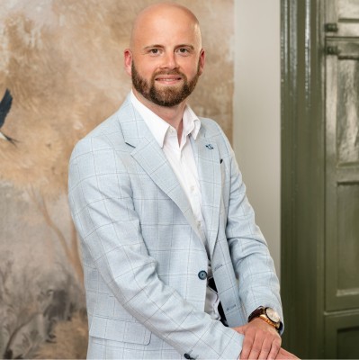 A headshot of Tomas Piacek