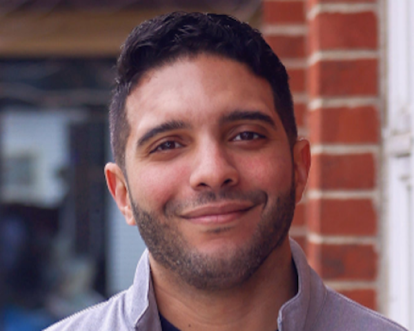 A headshot of Torrin Webb